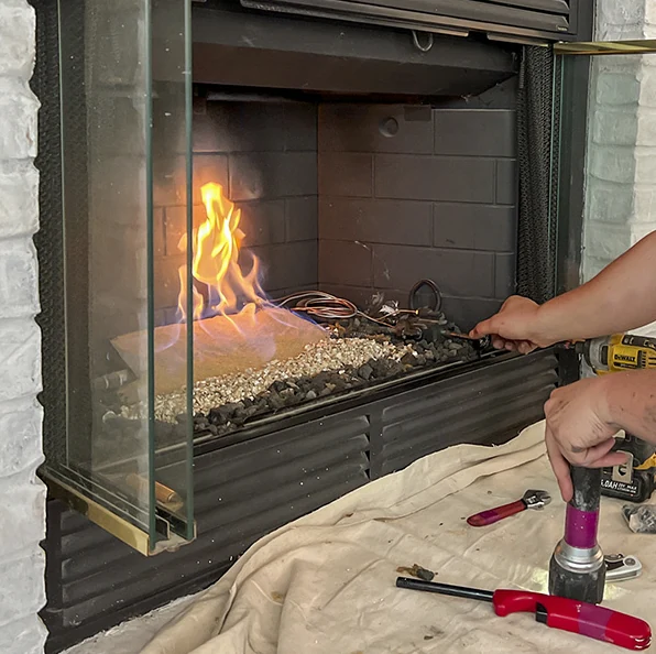 Gas Fireplace Repair professional at work in Huntsville, AL